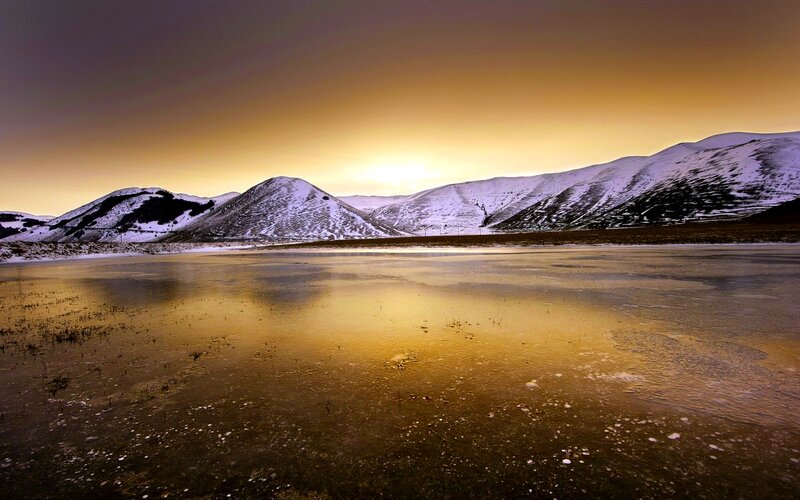 Frozen Lake at Sunset — Gold