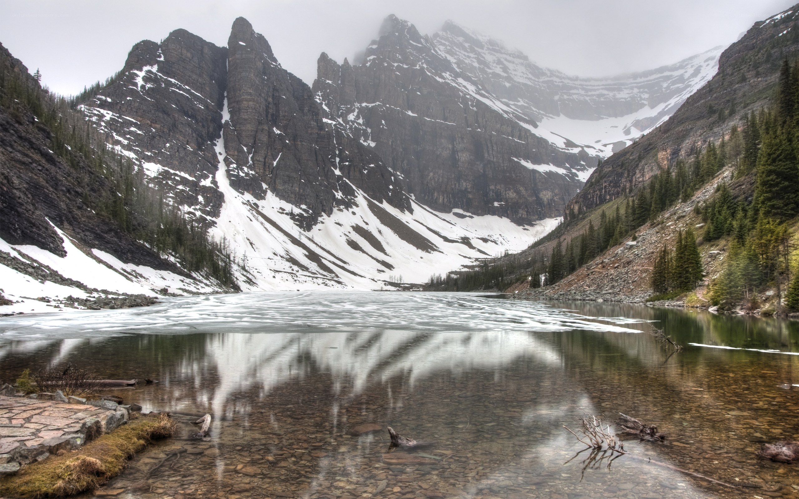 frozen lake in mountain valley