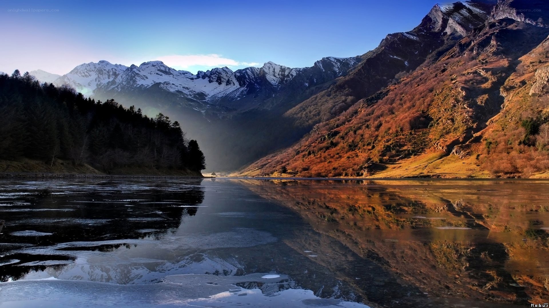 frozen lake in mountain valley