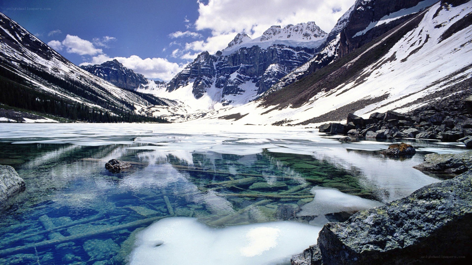 frozen lake in mountain valley