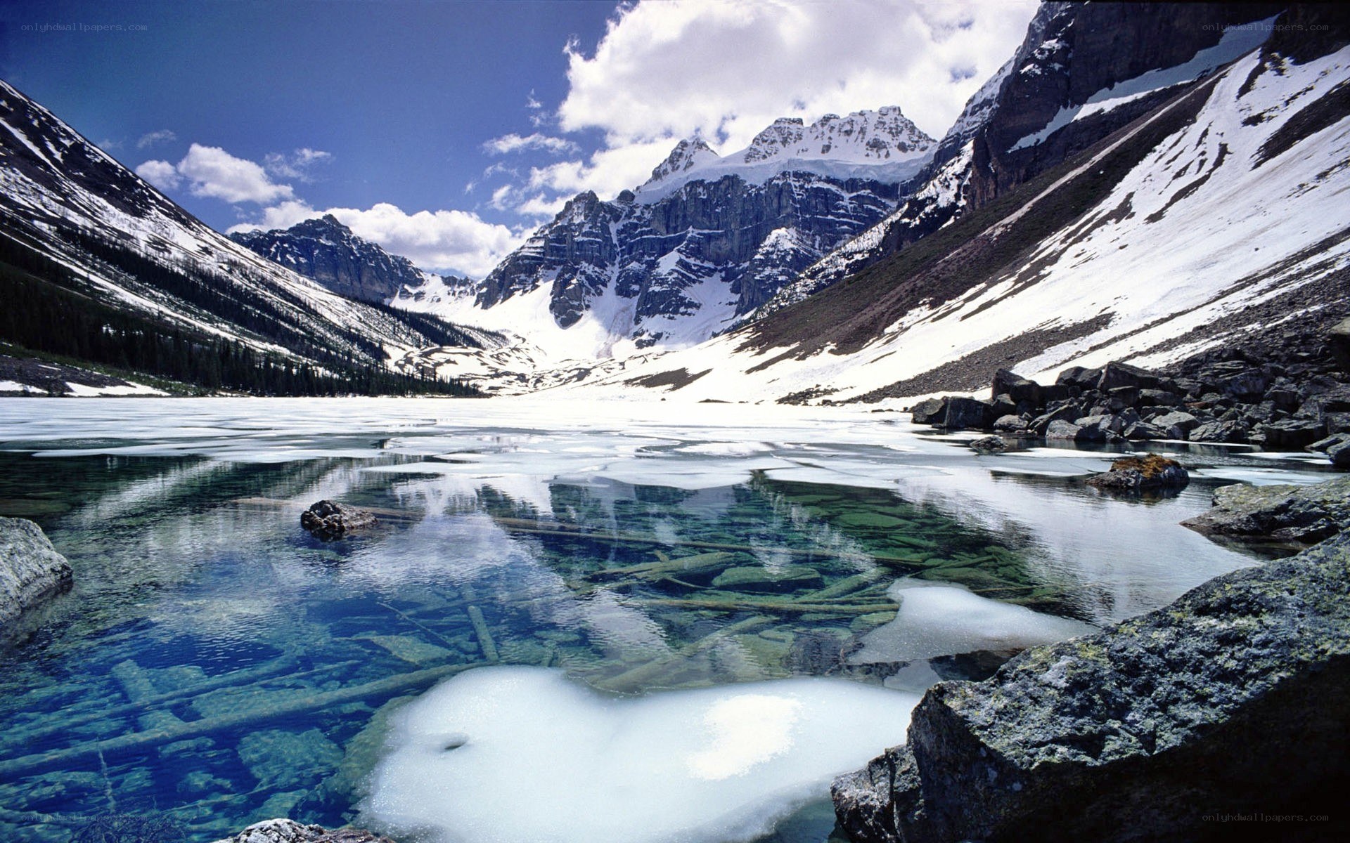 frozen lake in mountain valley