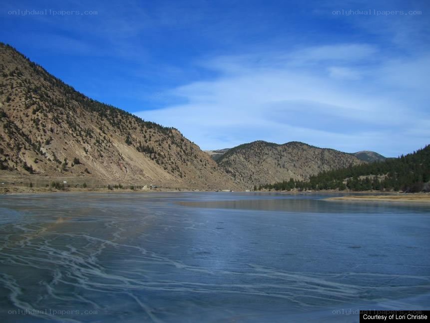 frozen lake in mountain valley