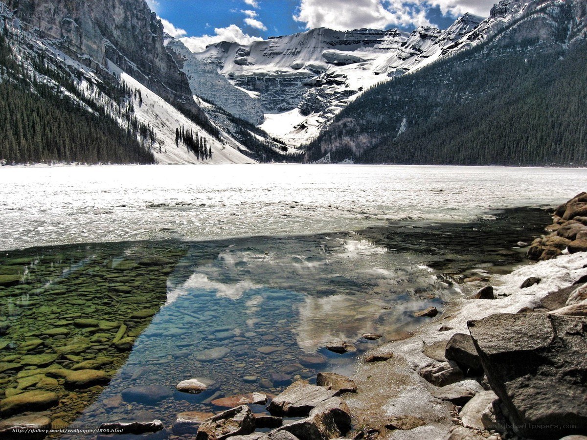frozen lake in mountain valley