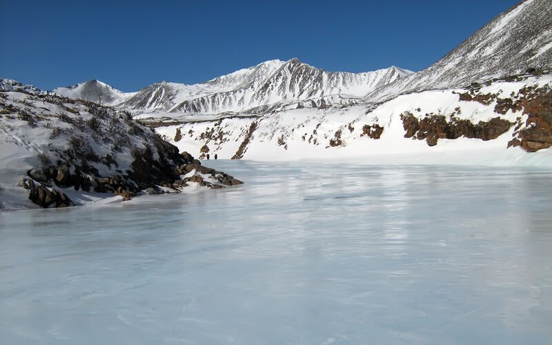 Frozen Lake in Mountains — Blue, Serene, Winter, Photograph, Snow, Sky