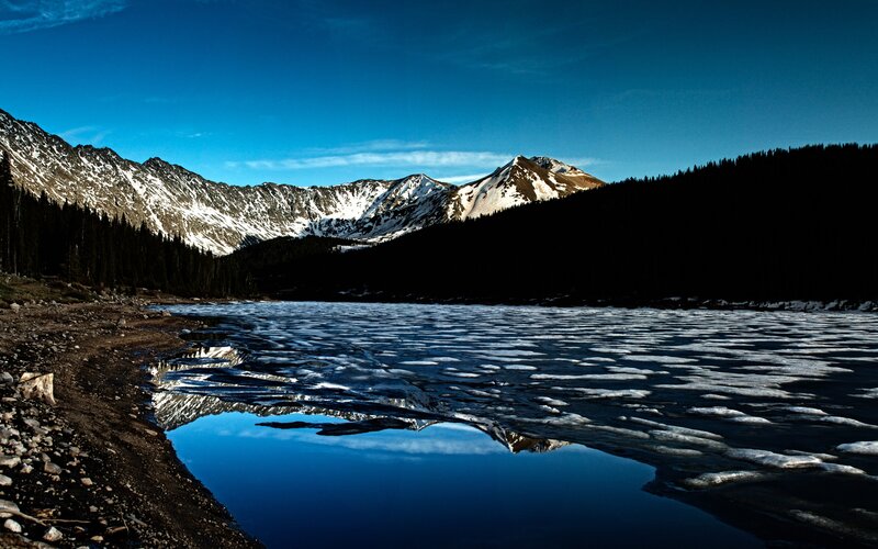 Frozen Lake in Mountains — Blue, Serene, Winter, Photograph, Snow, Trees, Black