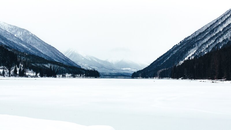 Frozen Lake in Mountains — White, Cold, Winter