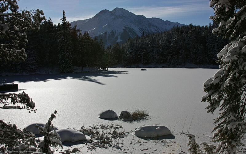 Frozen Lake in Winter — White, Serene, Photograph, Snow-covered Trees, Mountain