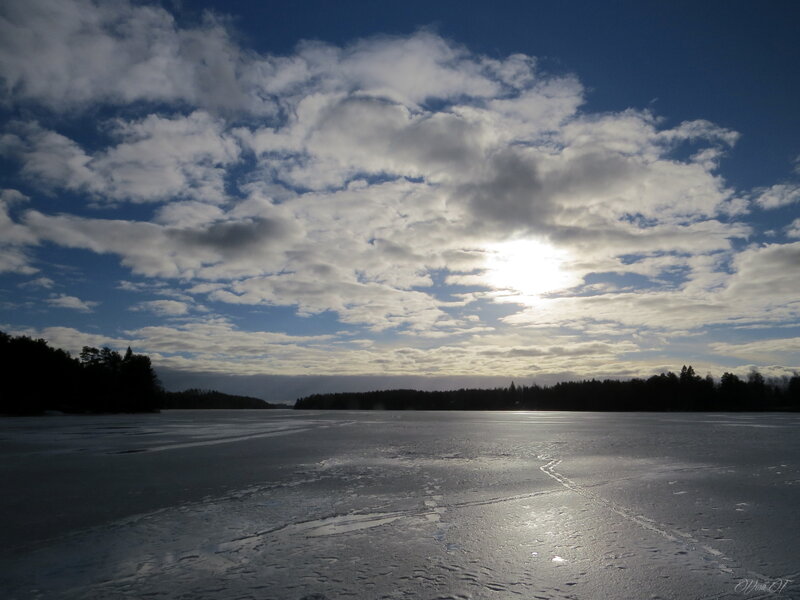 Frozen Lake under Cloudy Sky — Blue