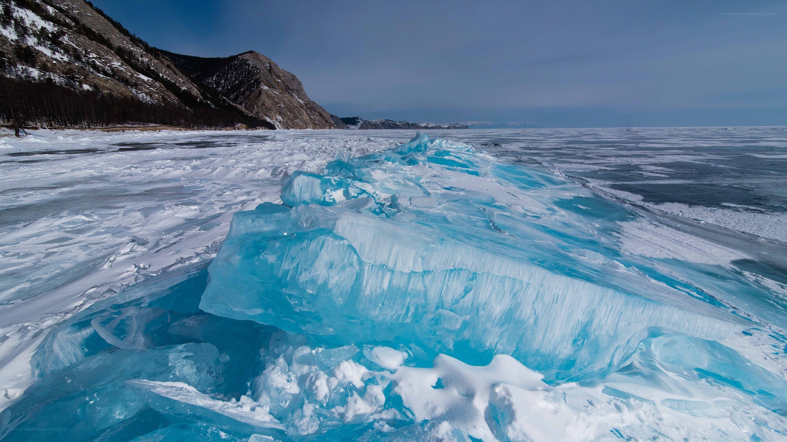 Frozen lake with blue ice