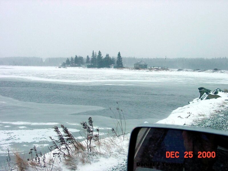 frozen lake with cabin