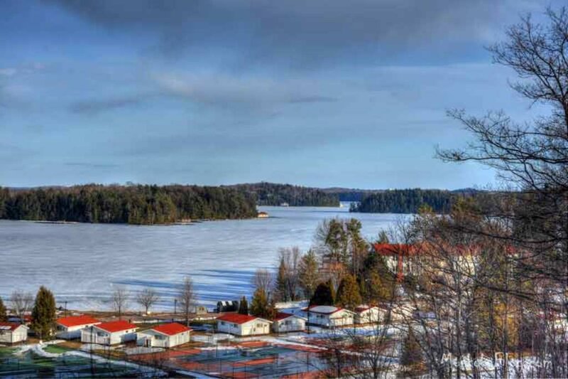 Frozen Lake with Cabins