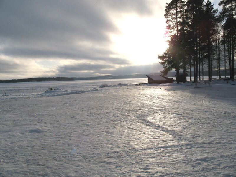 Frozen Lake with Cabins — White, Serene