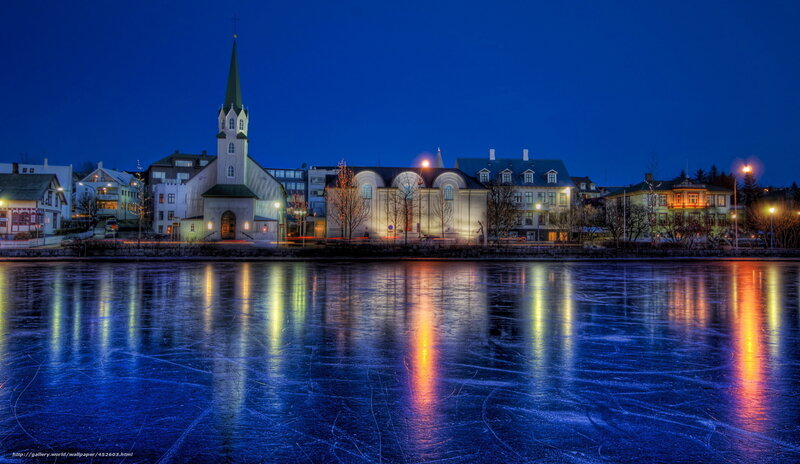 Frozen Lake with City Lights
