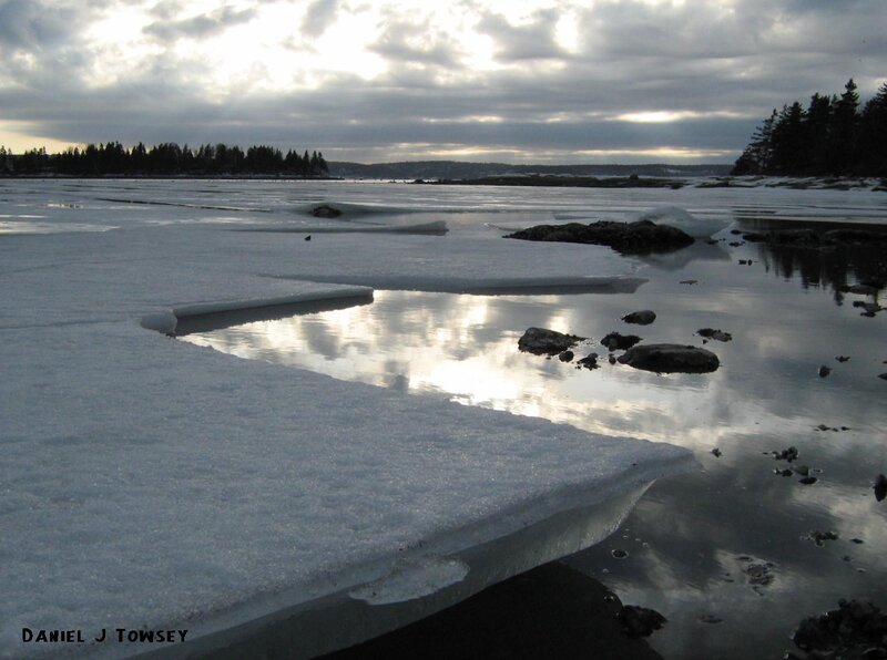 Frozen lake with ice and water
