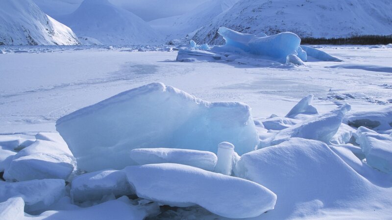 Frozen lake with ice chunks