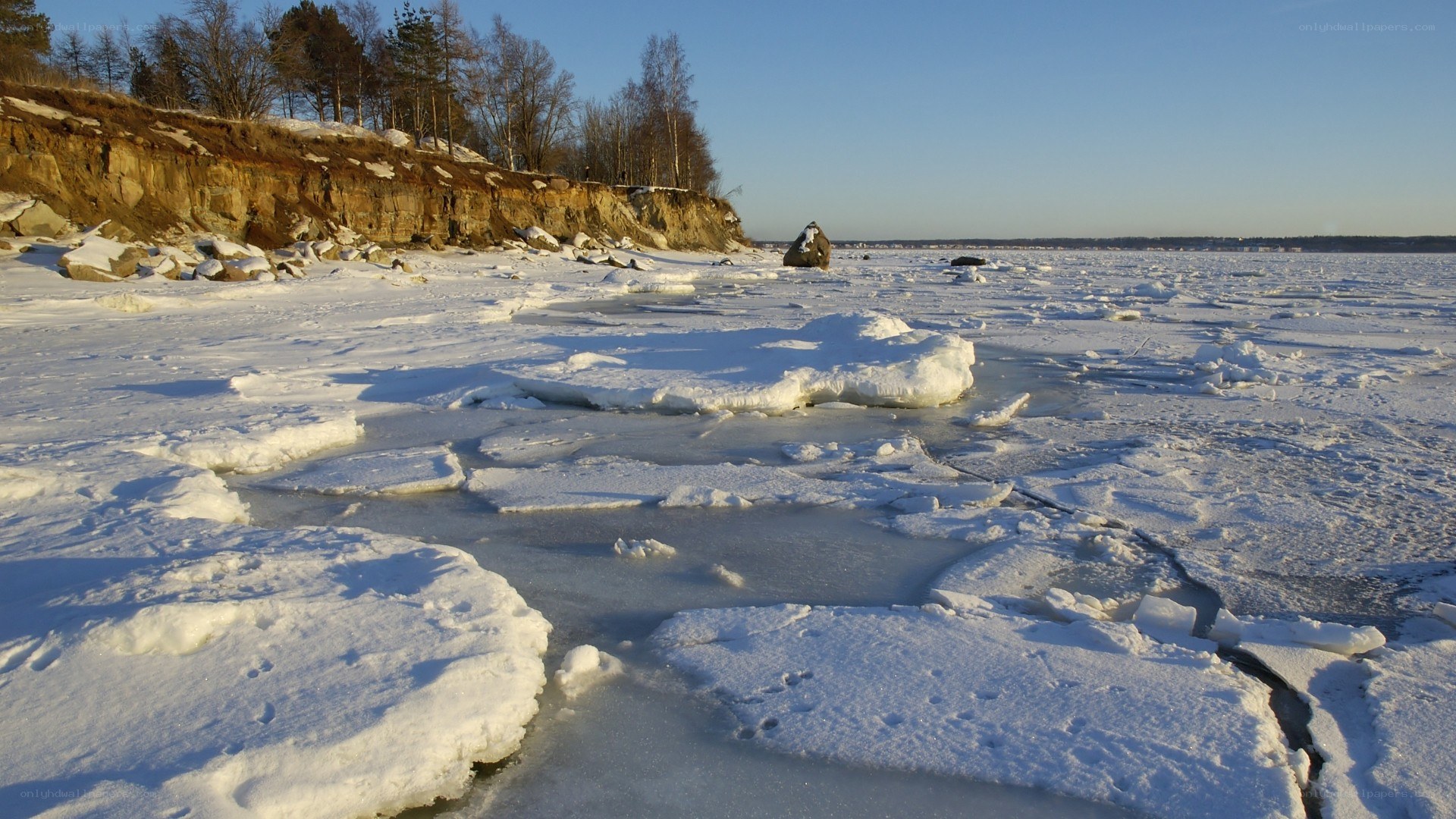 Frozen lake with ice floes