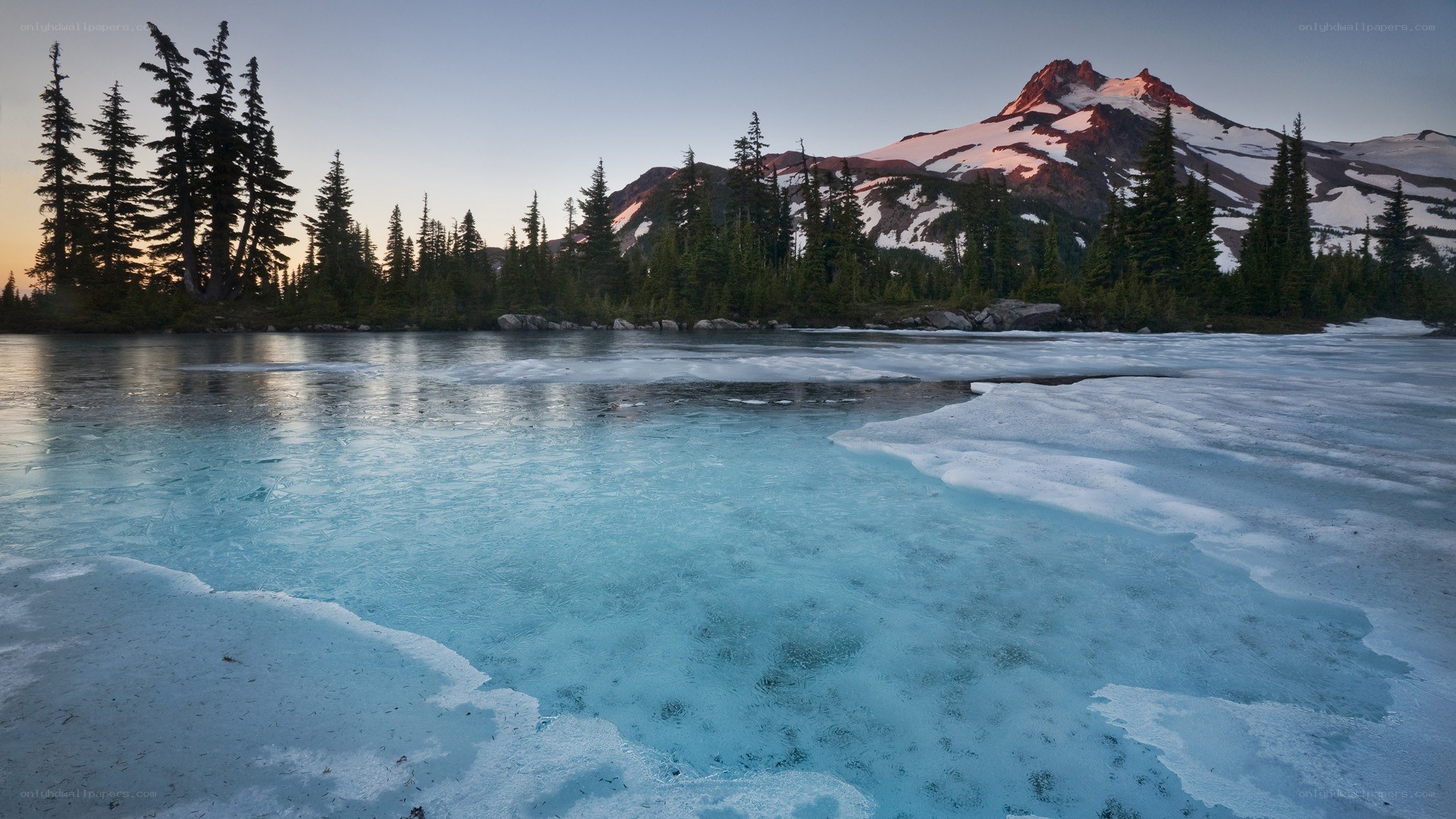 Frozen lake with mountain view