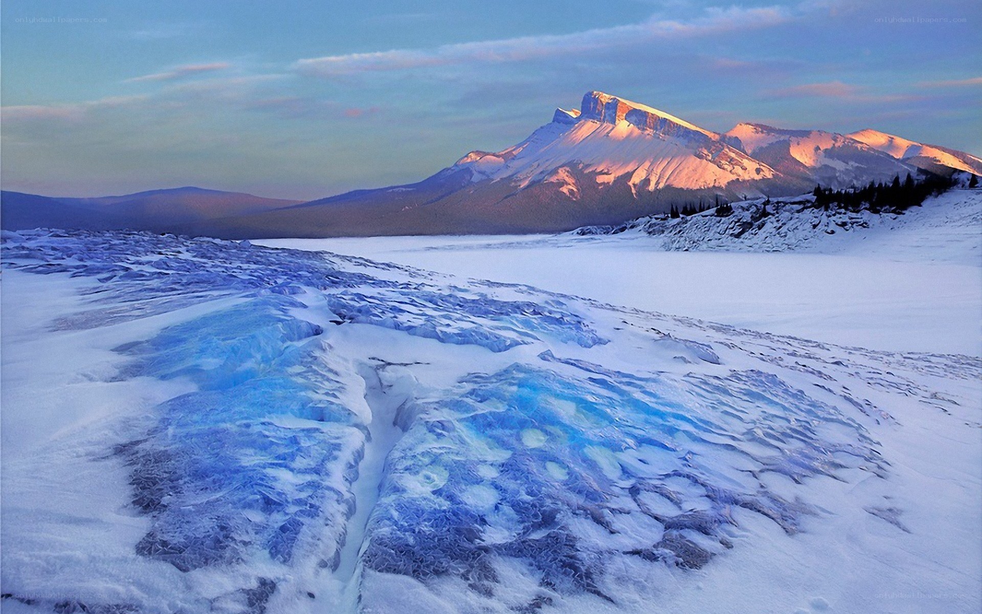 Frozen lake with mountain view