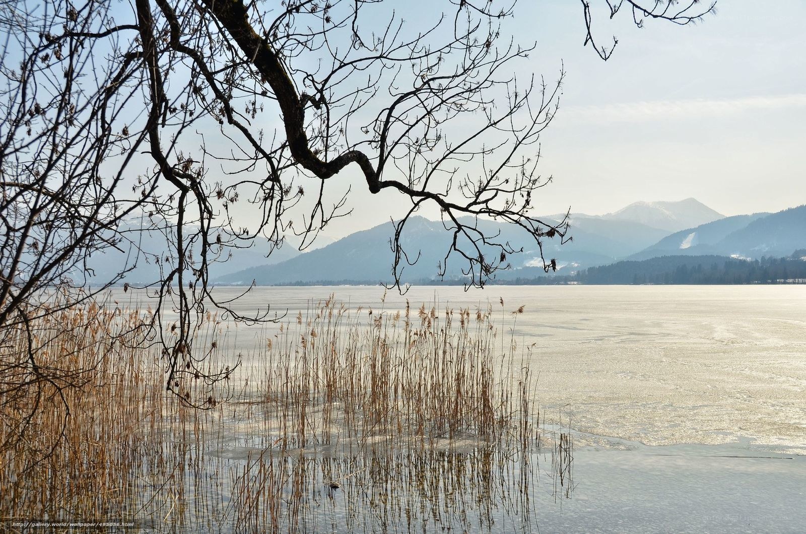 Frozen lake with mountains