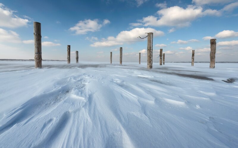 Frozen Lake with Posts