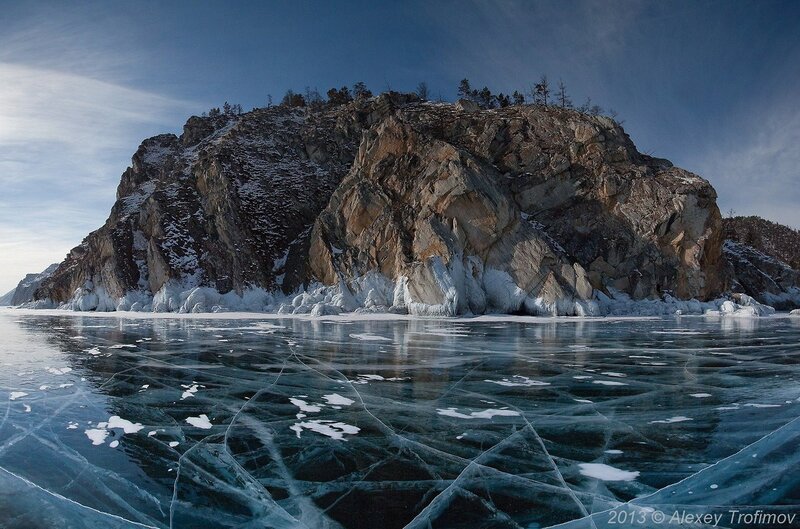 Frozen Lake with Rock Formation