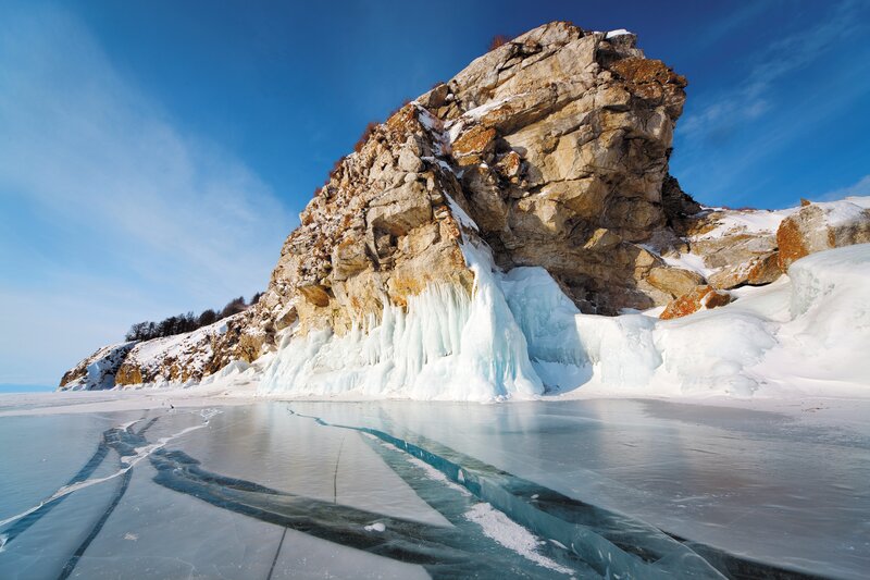 Frozen Lake with Rock
