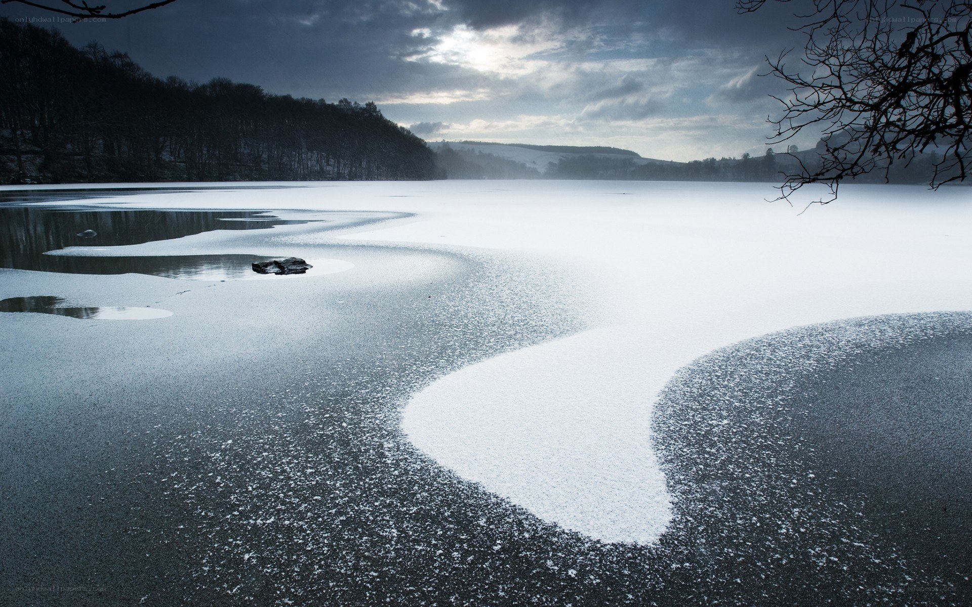 Frozen lake with snow and ice