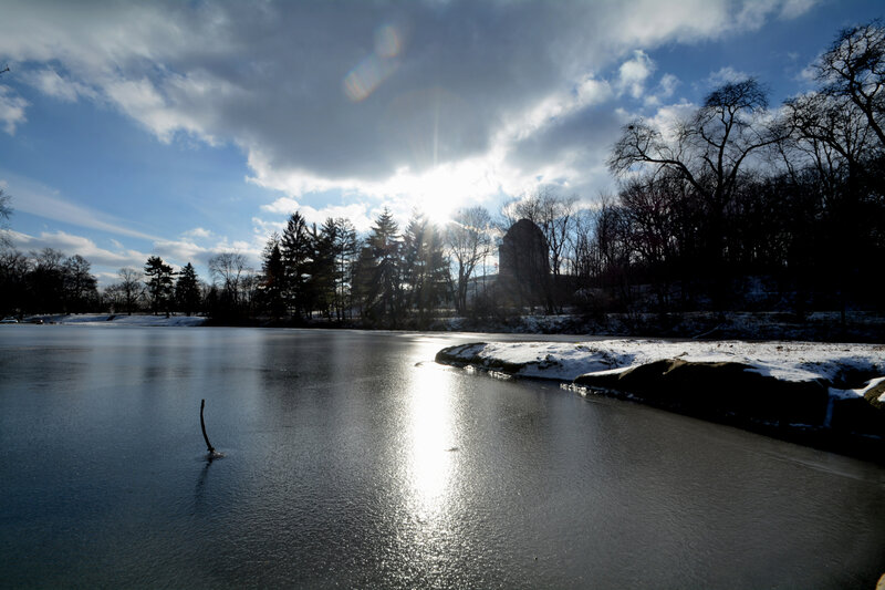 Frozen Lake with Sun Glare