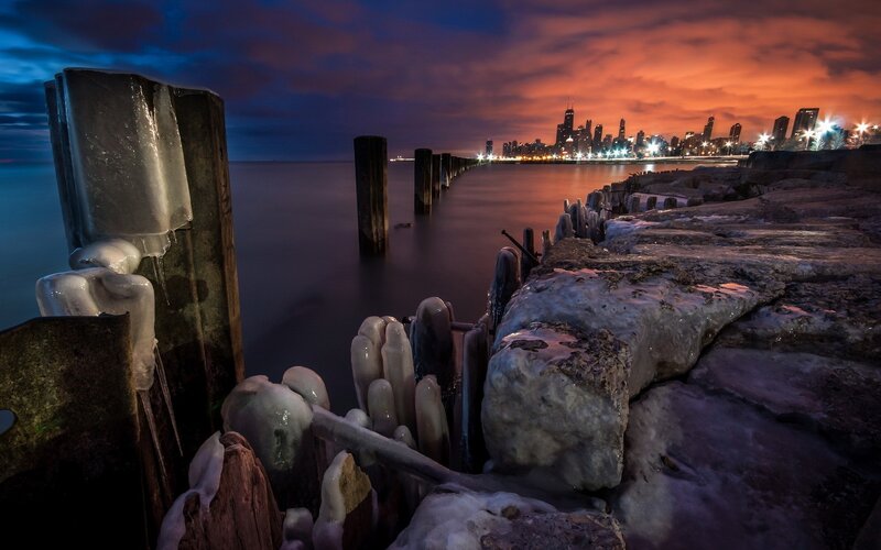 Frozen Pier at Dusk — Orange, Dramatic