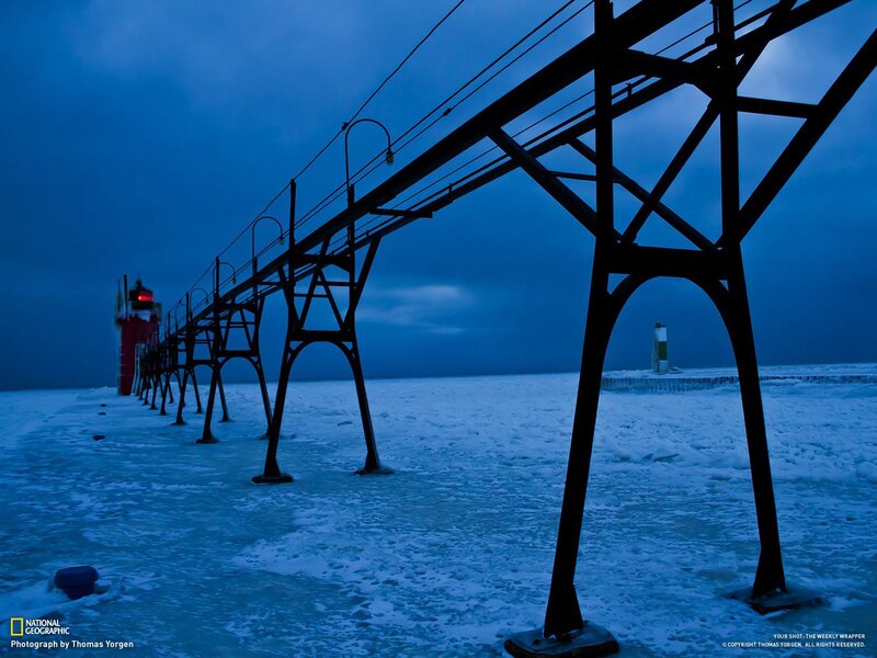 Frozen pier at dusk