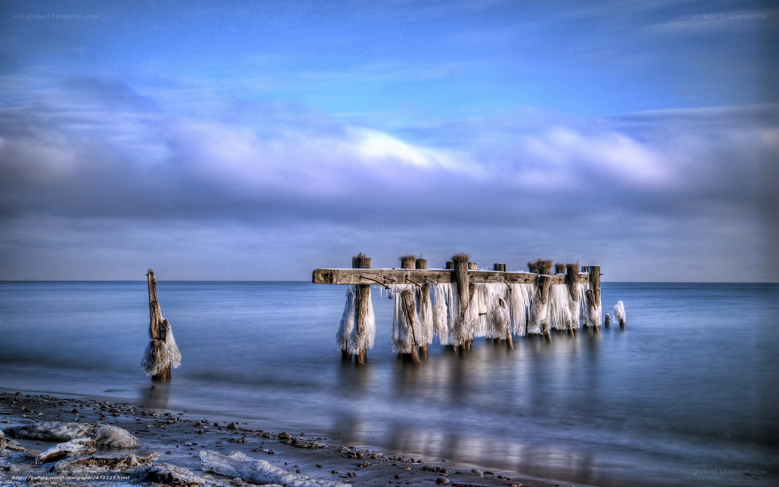Frozen pier at the shore