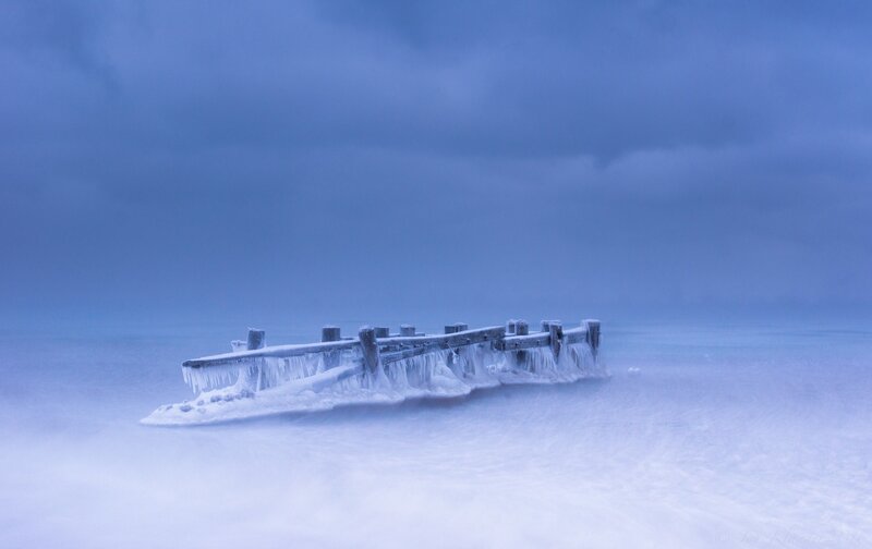 Frozen Pier in Winter — Blue, Cold, Serene