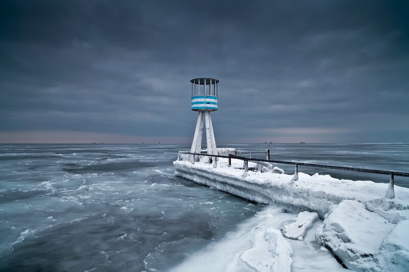Frozen Pier with Beacon