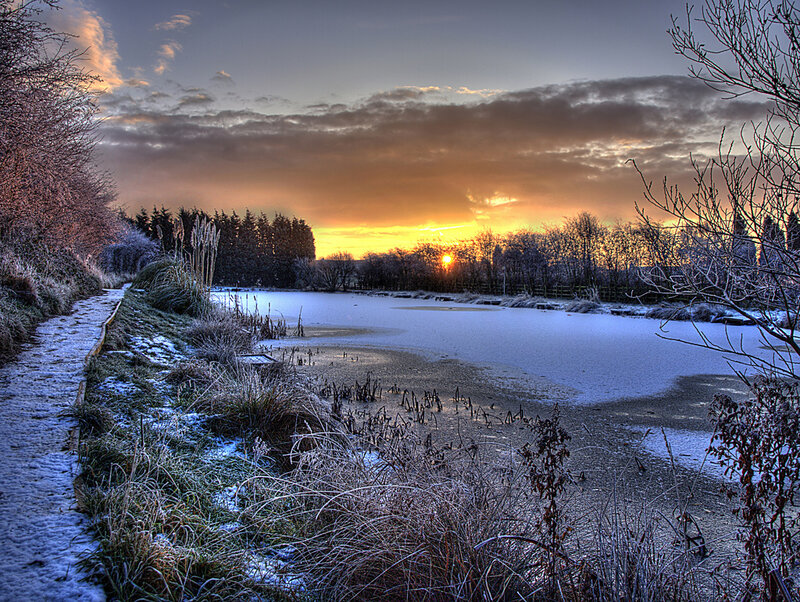 Frozen Pond at Sunset — Orange