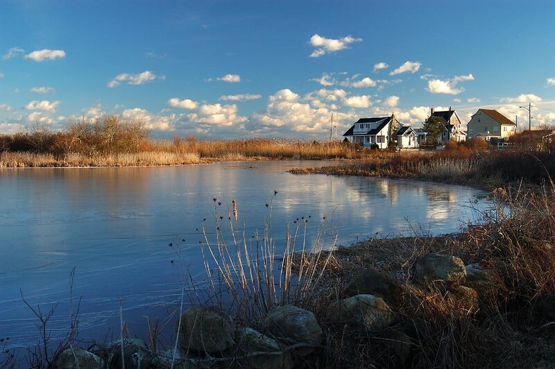 Frozen Pond with Houses