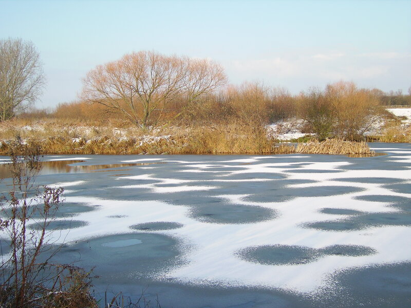 Frozen Pond with Ice Patches