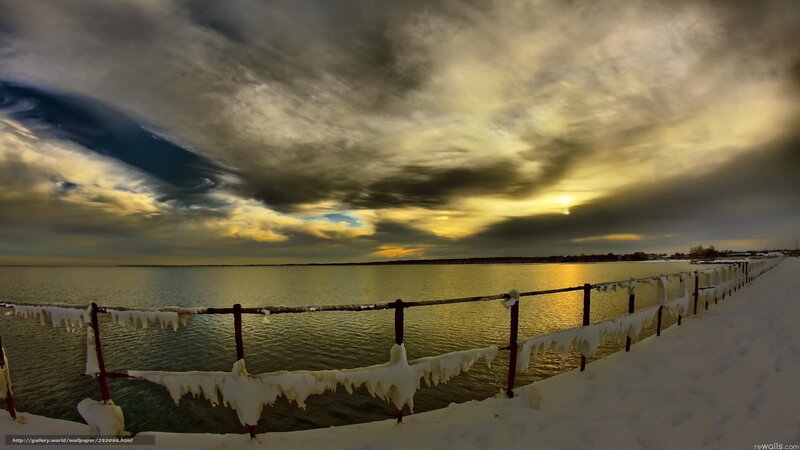 Frozen railing at sunset