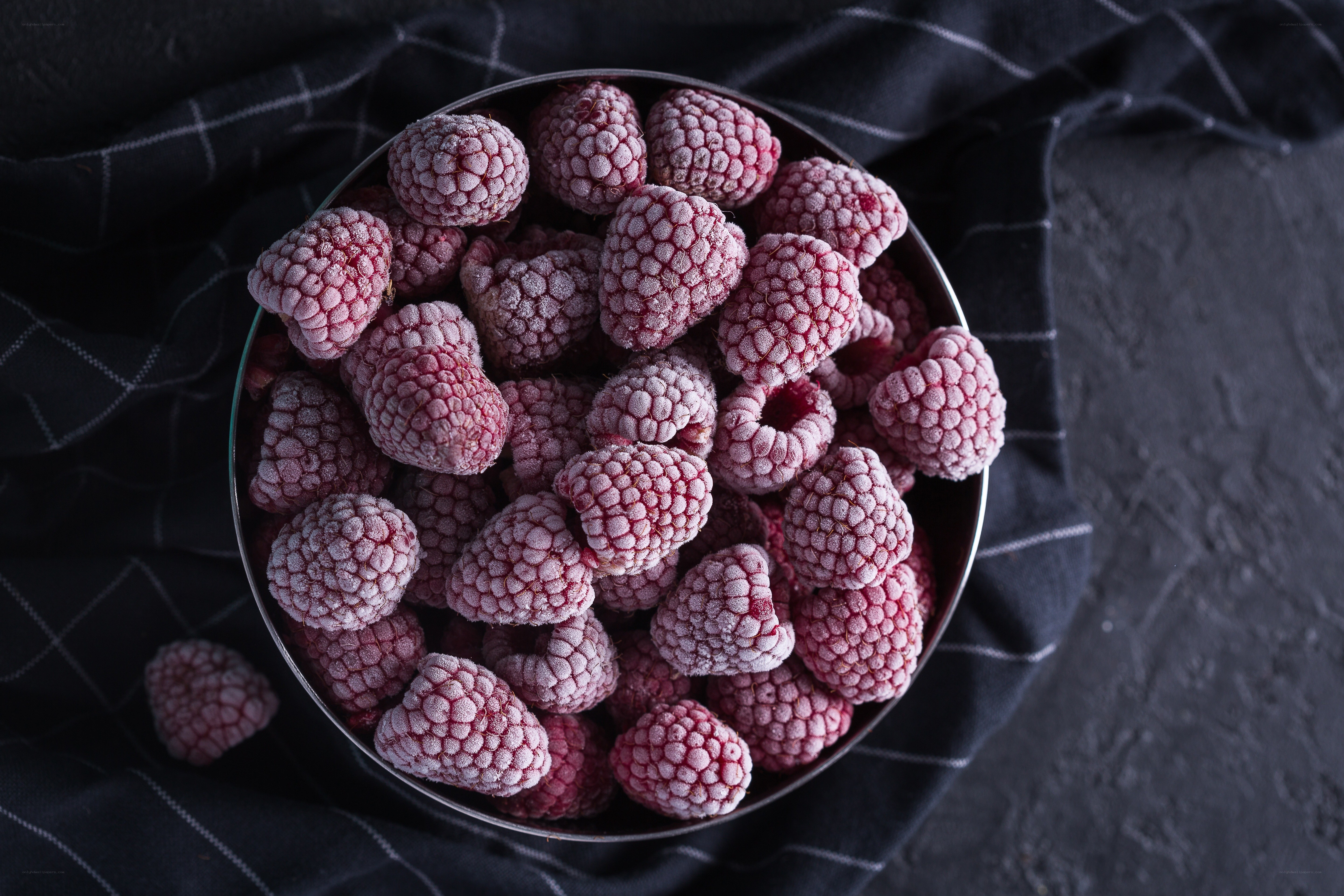 frozen raspberries in a bowl