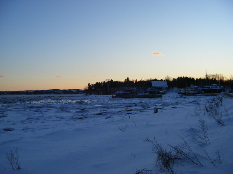 Frozen river at dusk
