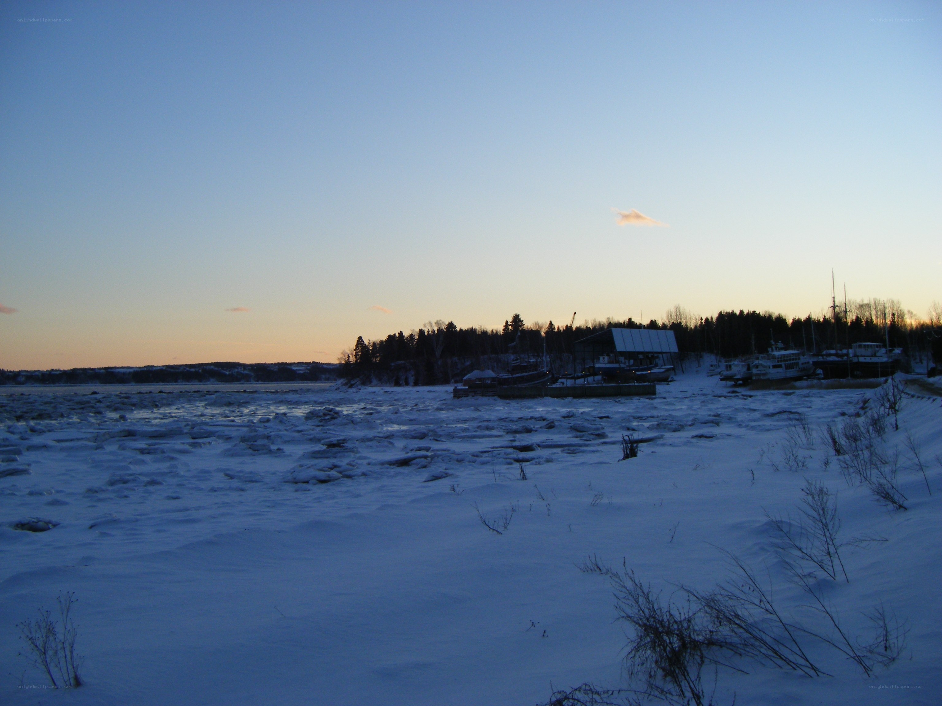 Frozen river at dusk