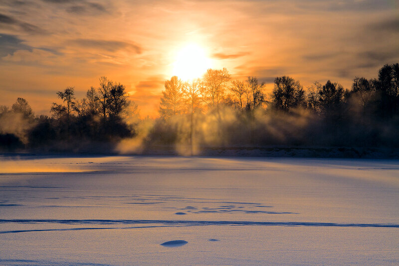 Frozen River at Sunrise — Orange, Serene, Winter