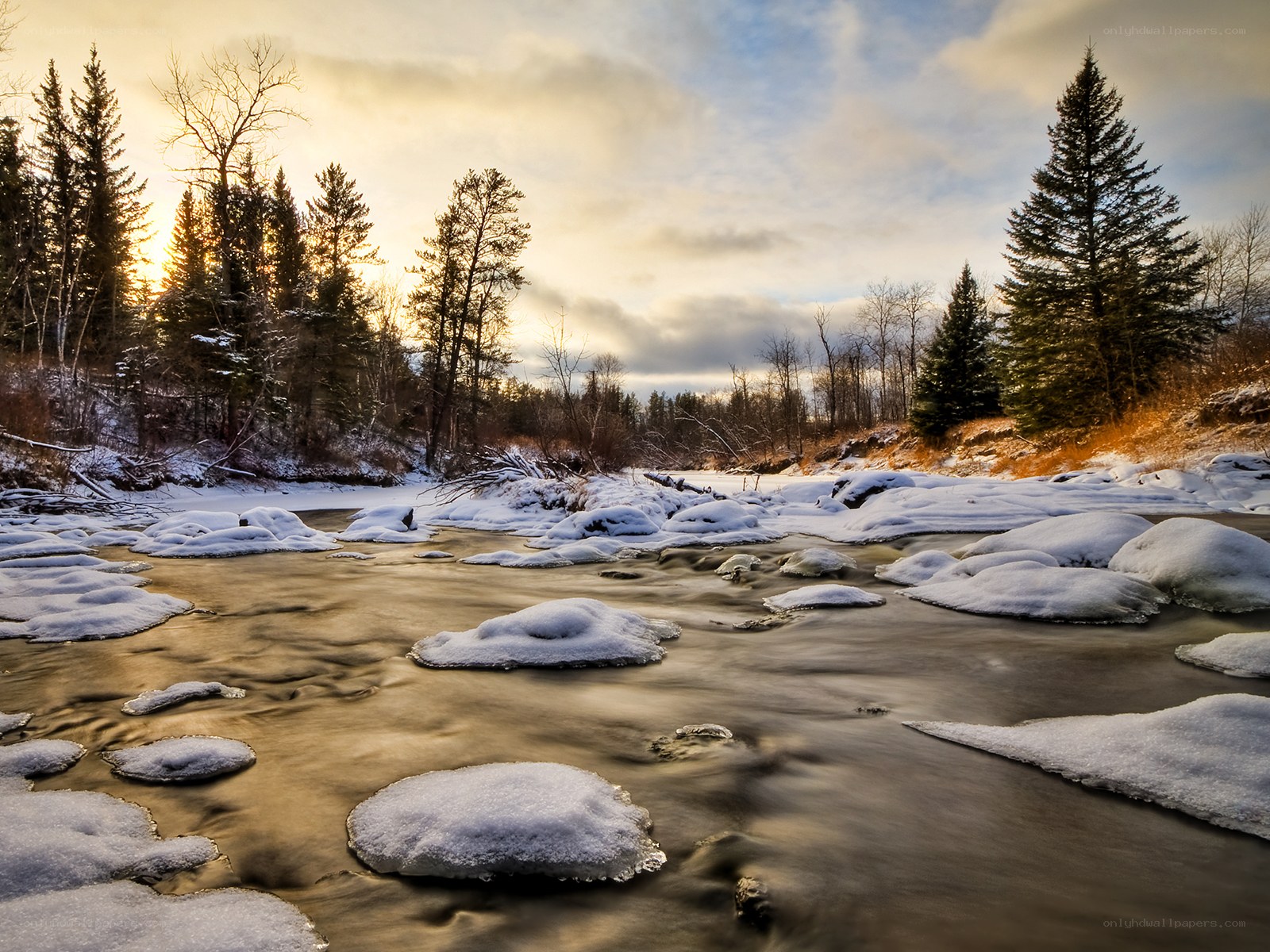 Frozen river at sunset