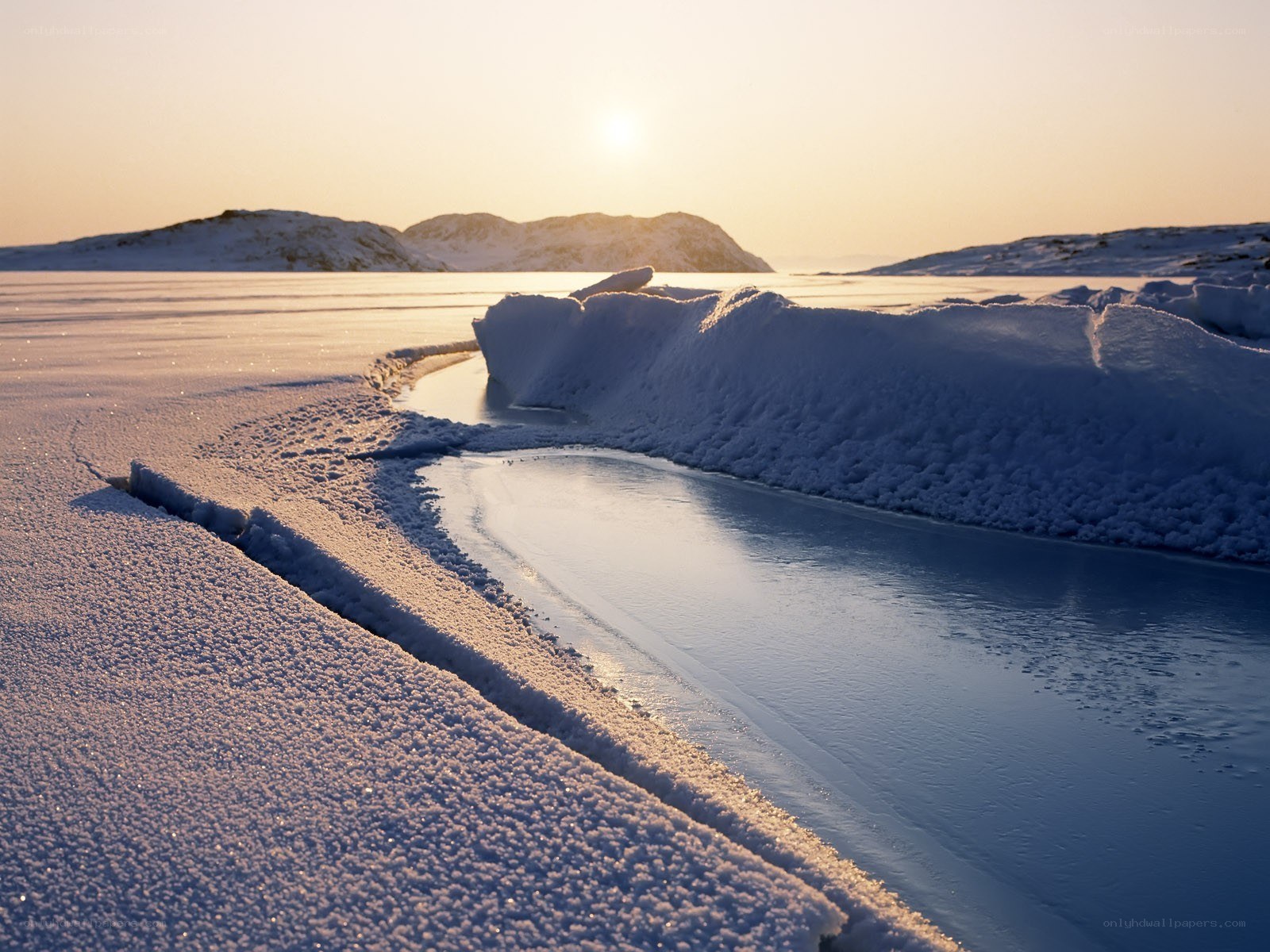 Frozen river at sunset