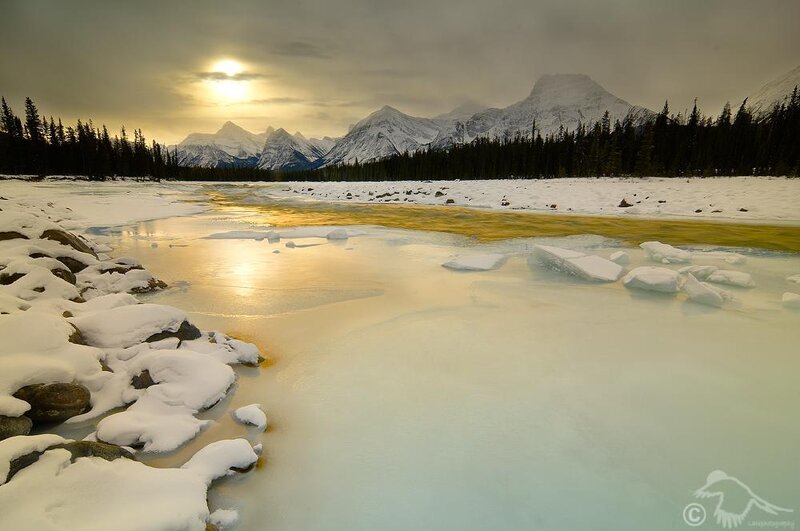 Frozen river at sunset