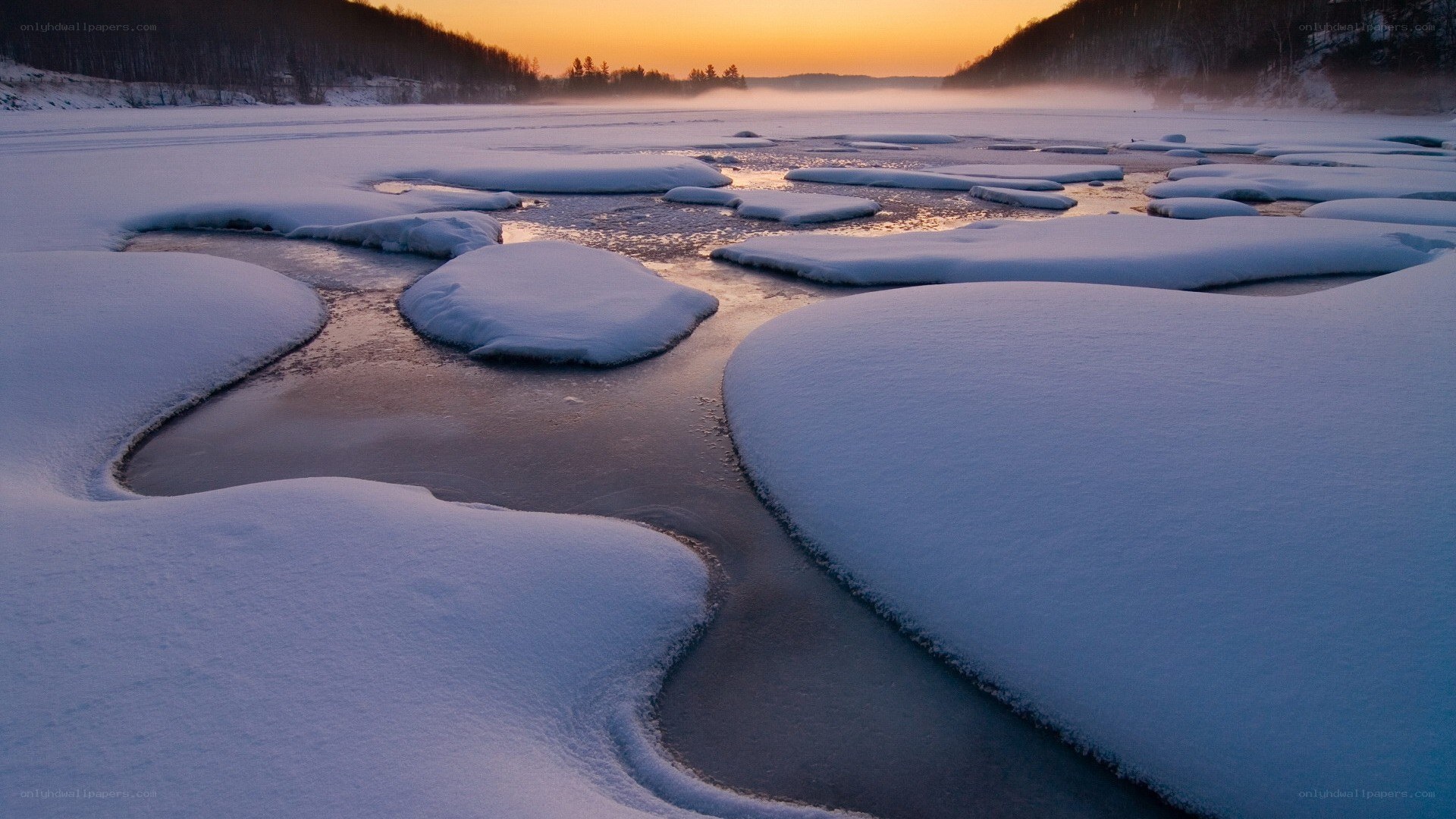 Frozen river at sunset
