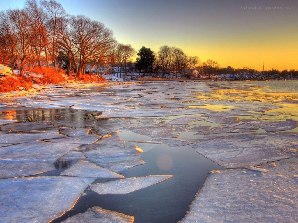 Frozen river at sunset