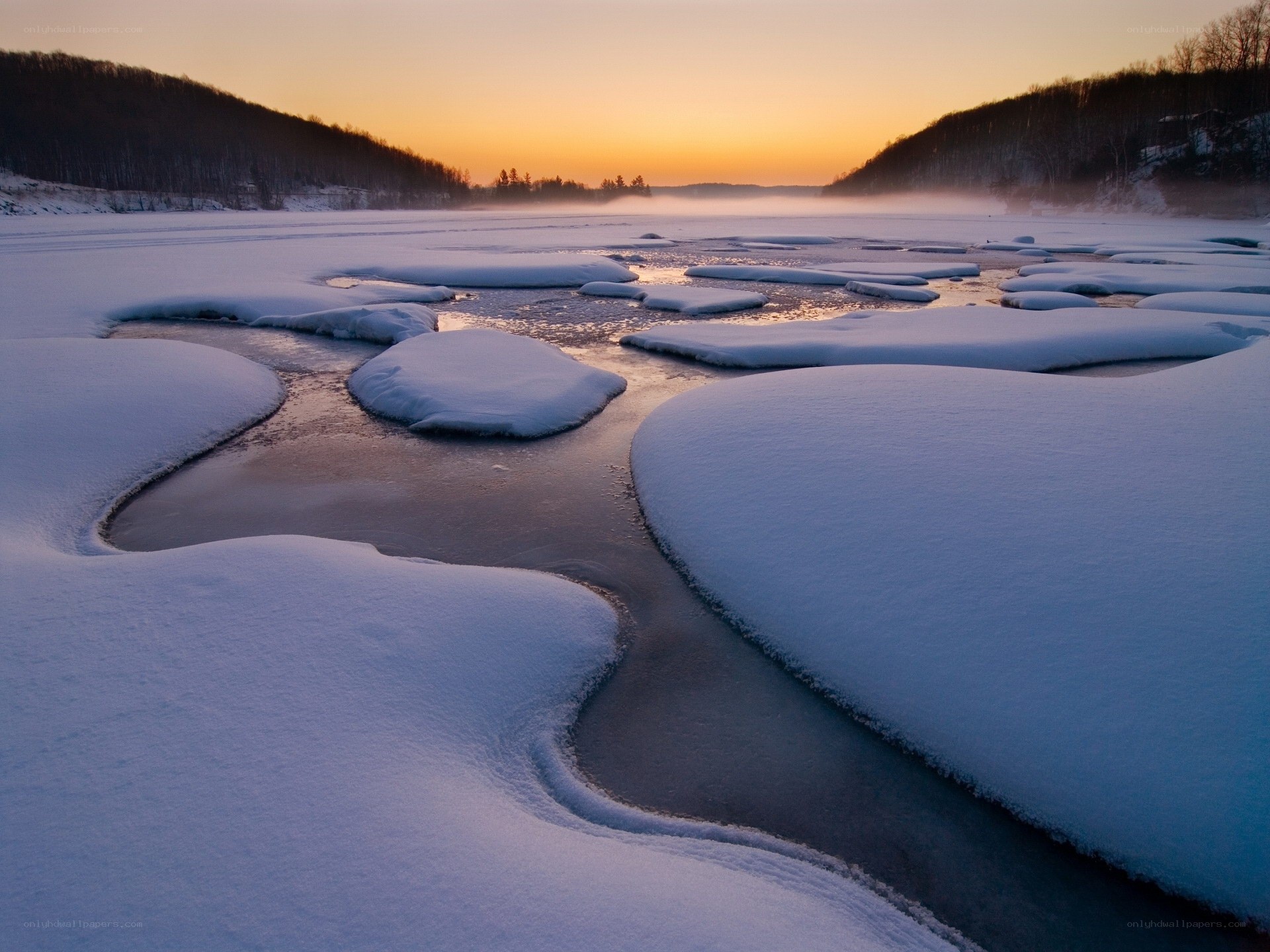 Frozen river at sunset