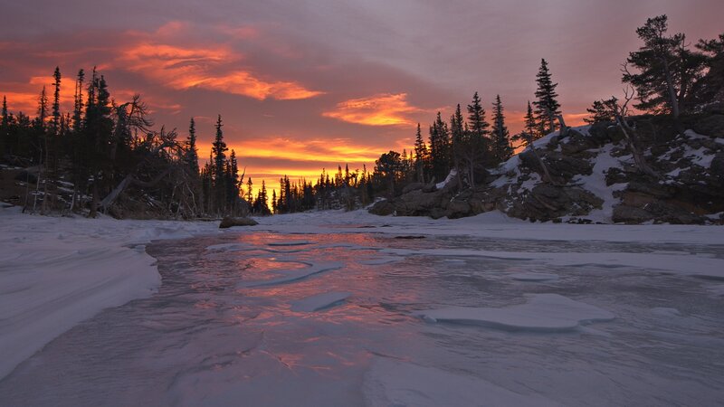 Frozen River at Sunset — Orange, Dramatic, Photograph, Trees, Rocks