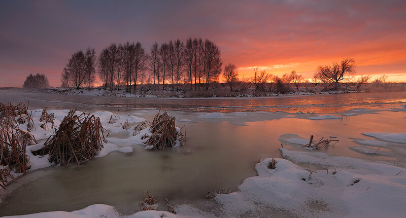 Frozen River at Sunset — Orange, Dramatic, Photograph, Trees, Snow, Sky