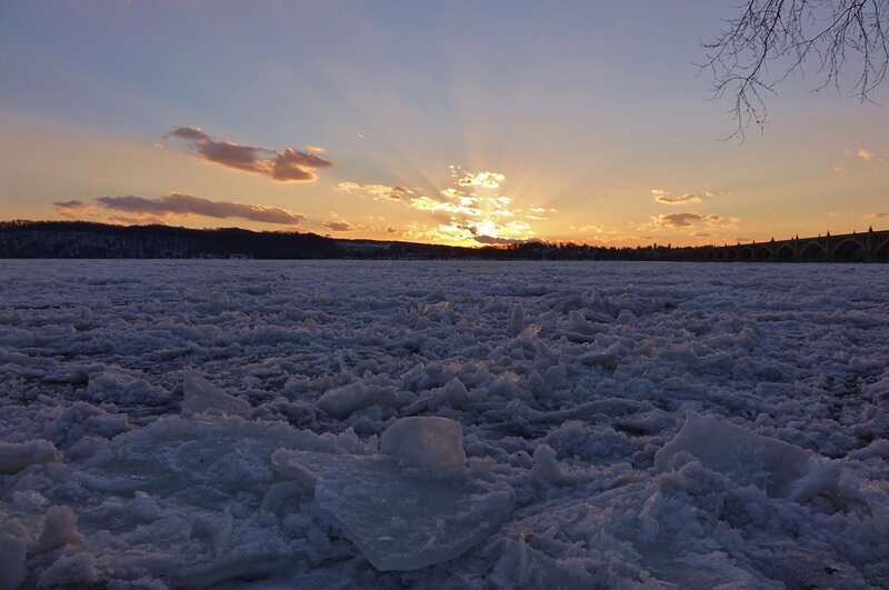 Frozen River at Sunset — Orange, Serene, Winter